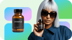 Woman in sunglasses holding a small ORAKKLE bottle next to a larger one, against a colorful background.