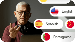 A man in glasses speaking at a laptop, with language options for English, Spanish, and Portuguese displayed beside him.