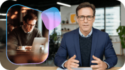 A man in a suit speaking, with an inset thought bubble showing him working on a laptop in a café.